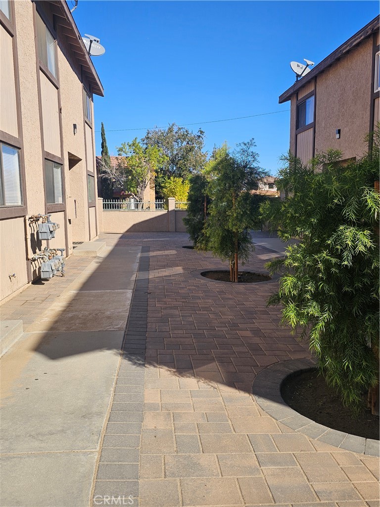 438 East Ave Q7, Unit B Palmdale, CA 93550 - Photo 24 of 26 a view of a yard with plants