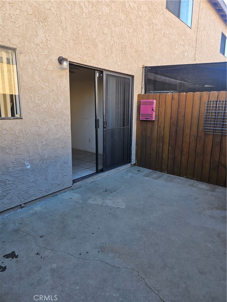 438 East Ave Q7, Unit B Palmdale, CA 93550 - Photo 8 of 26 a view of a wooden door