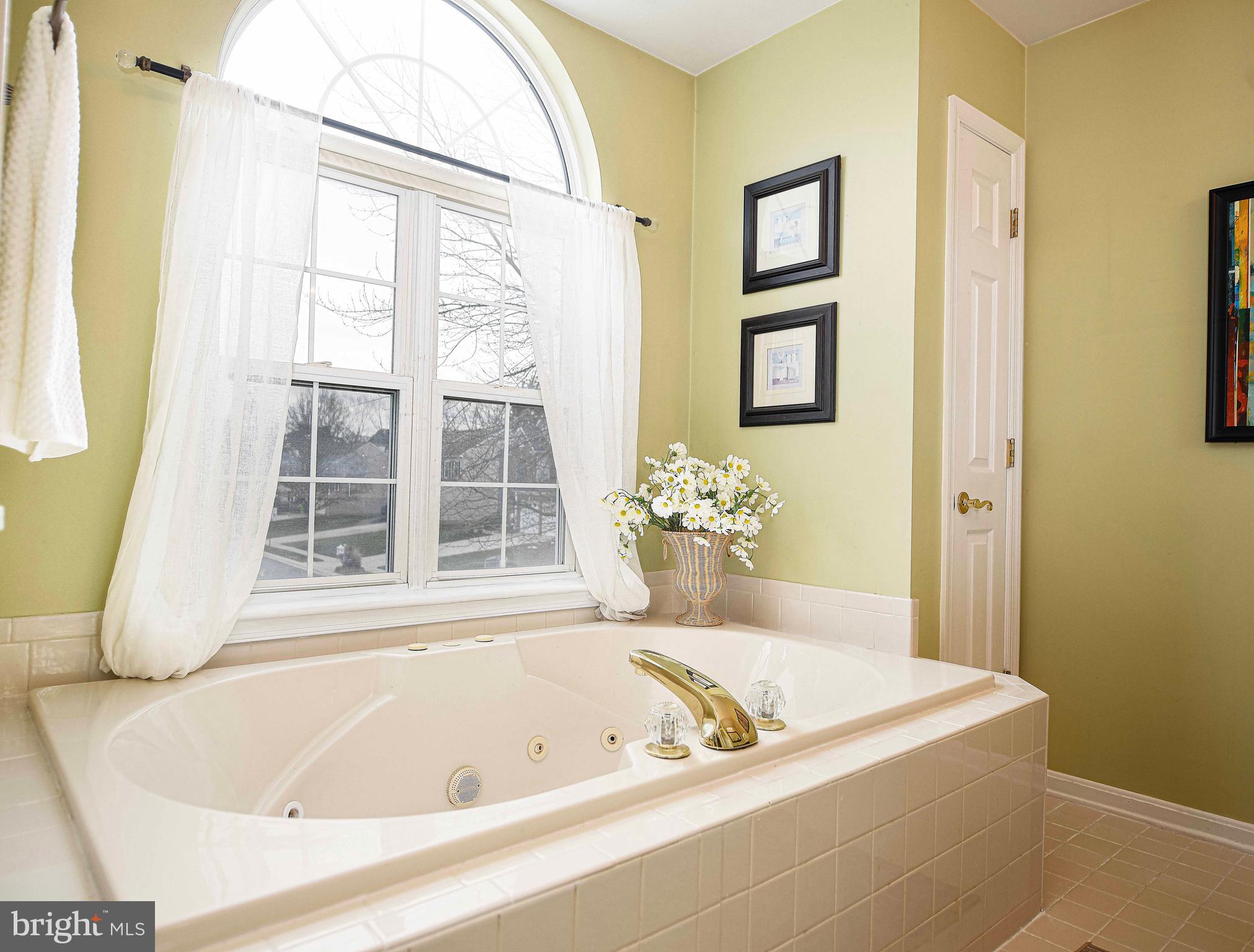 402 Hall Street Bel Air, MD 21014 - Photo 21 of 46 a bath tub sitting next to a window