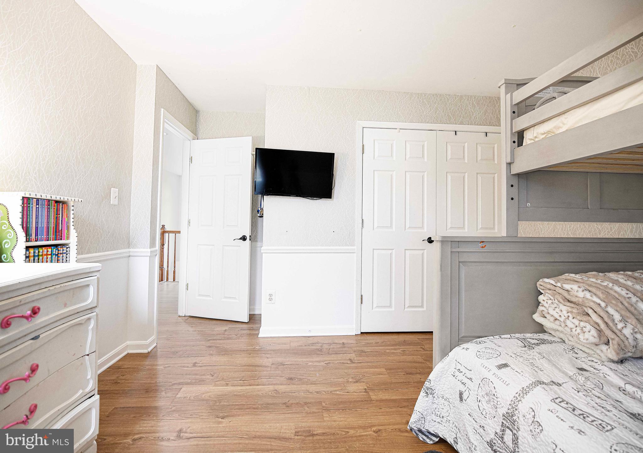 402 Hall Street Bel Air, MD 21014 - Photo 26 of 46 a bedroom with a bed and a flat screen tv