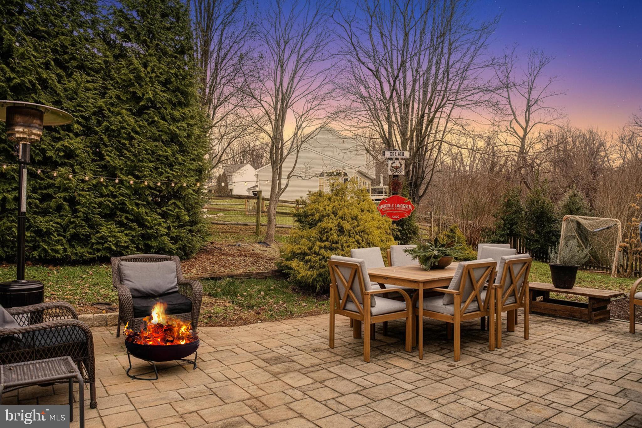 402 Hall Street Bel Air, MD 21014 - Photo 36 of 46 a backyard of a house with table and chairs