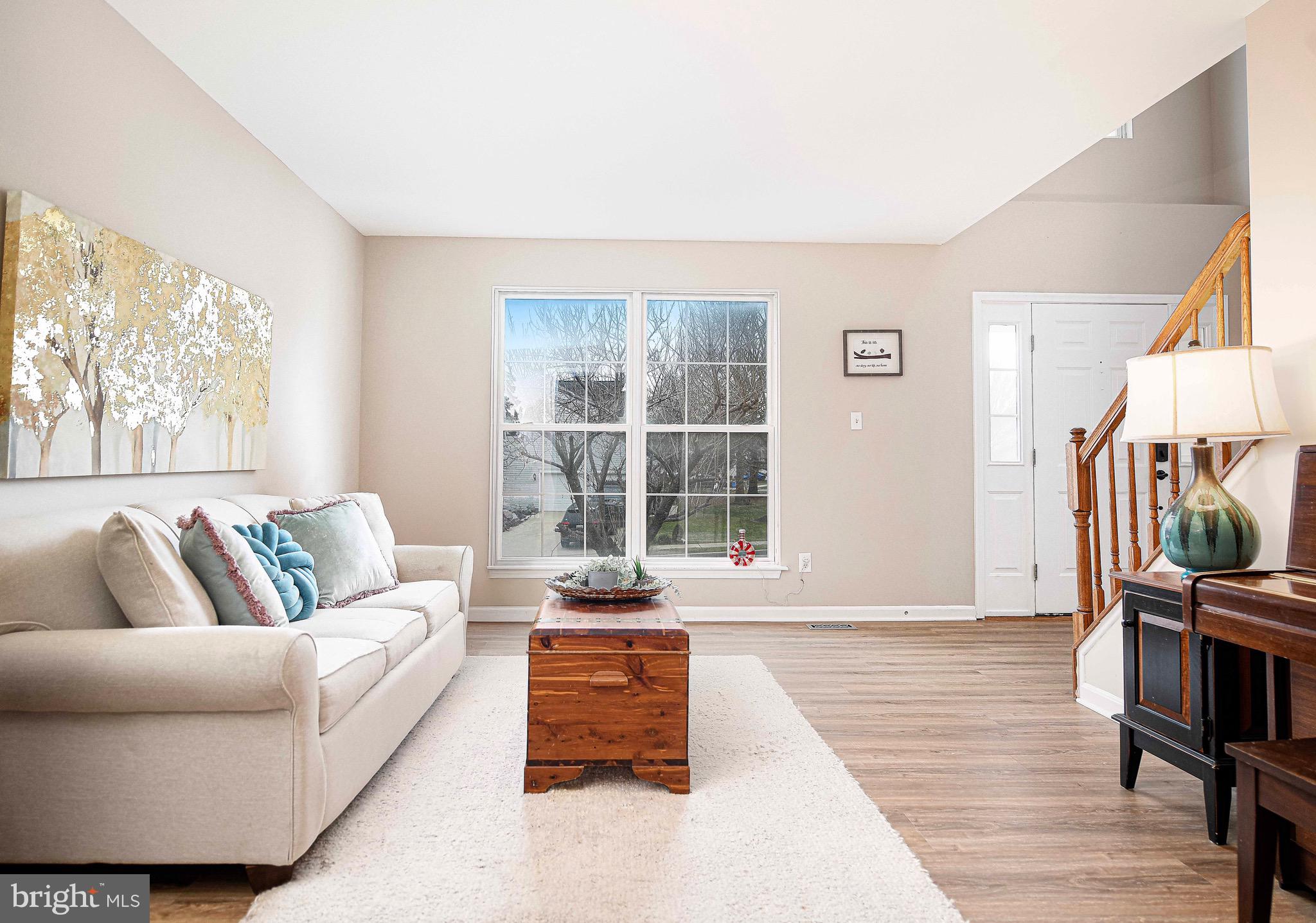 402 Hall Street Bel Air, MD 21014 - Photo 9 of 46 a living room with furniture and a flat screen tv