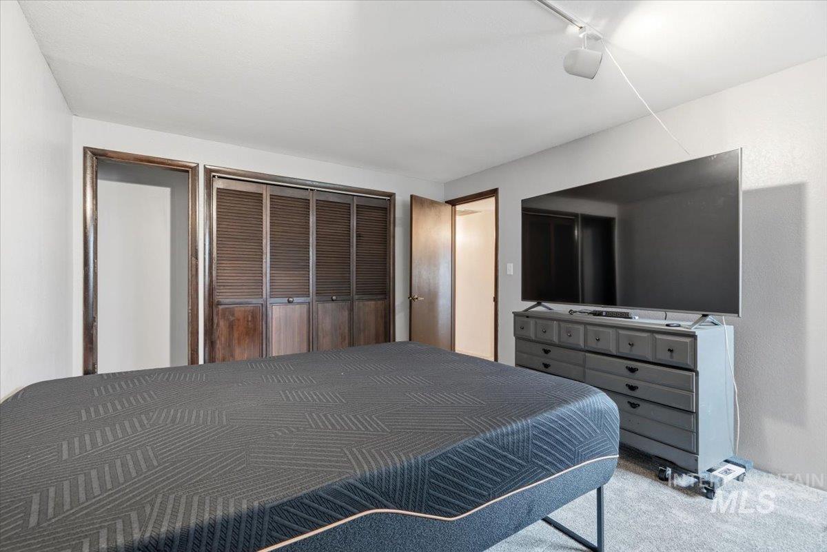 7771 Elmore Road Fruitland, ID 83619 - Photo 26 of 45 Bedroom with carpet and a closet