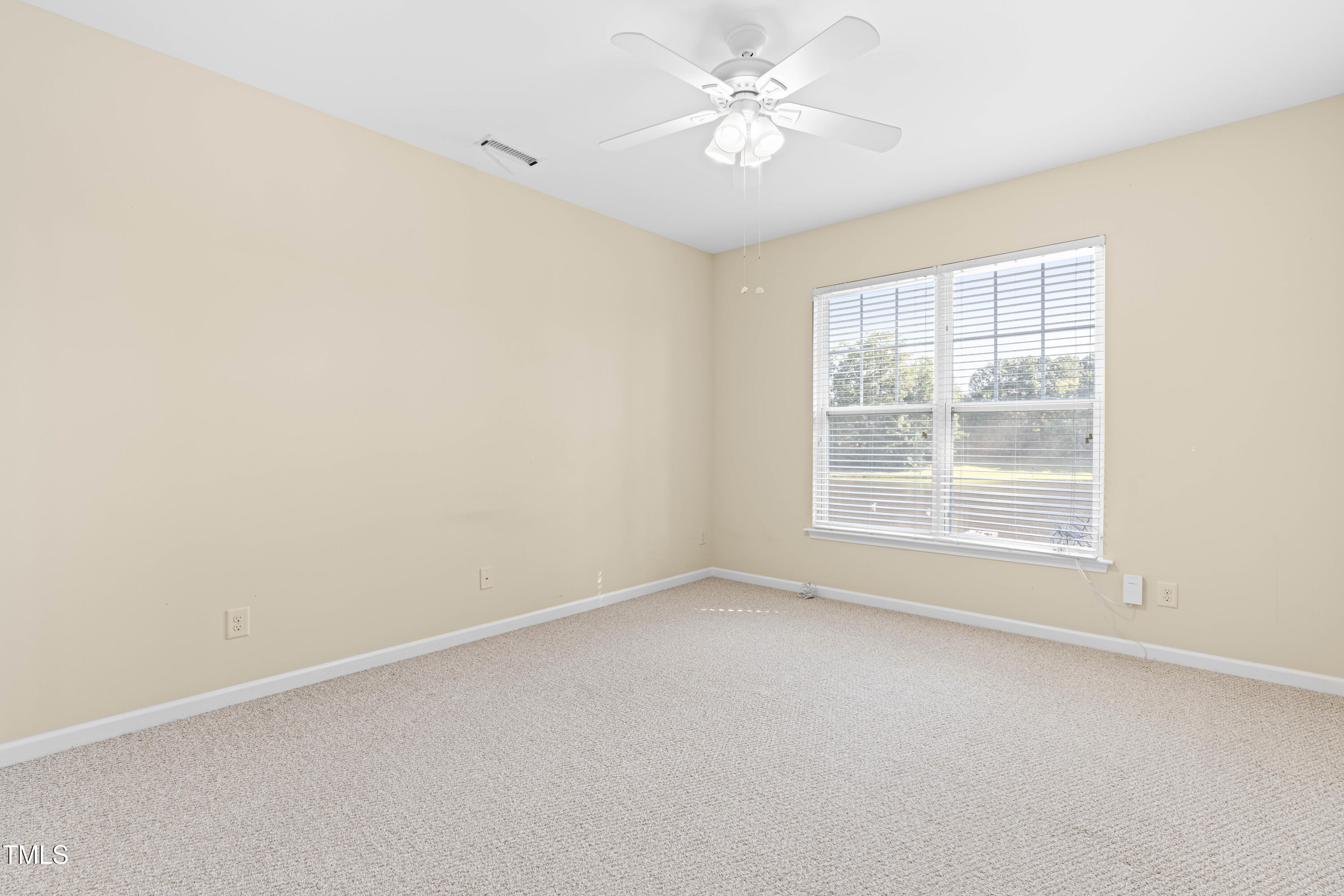 1305 Silver Beach Way Raleigh, NC 27606 - Photo 16 of 47 an empty room with a window