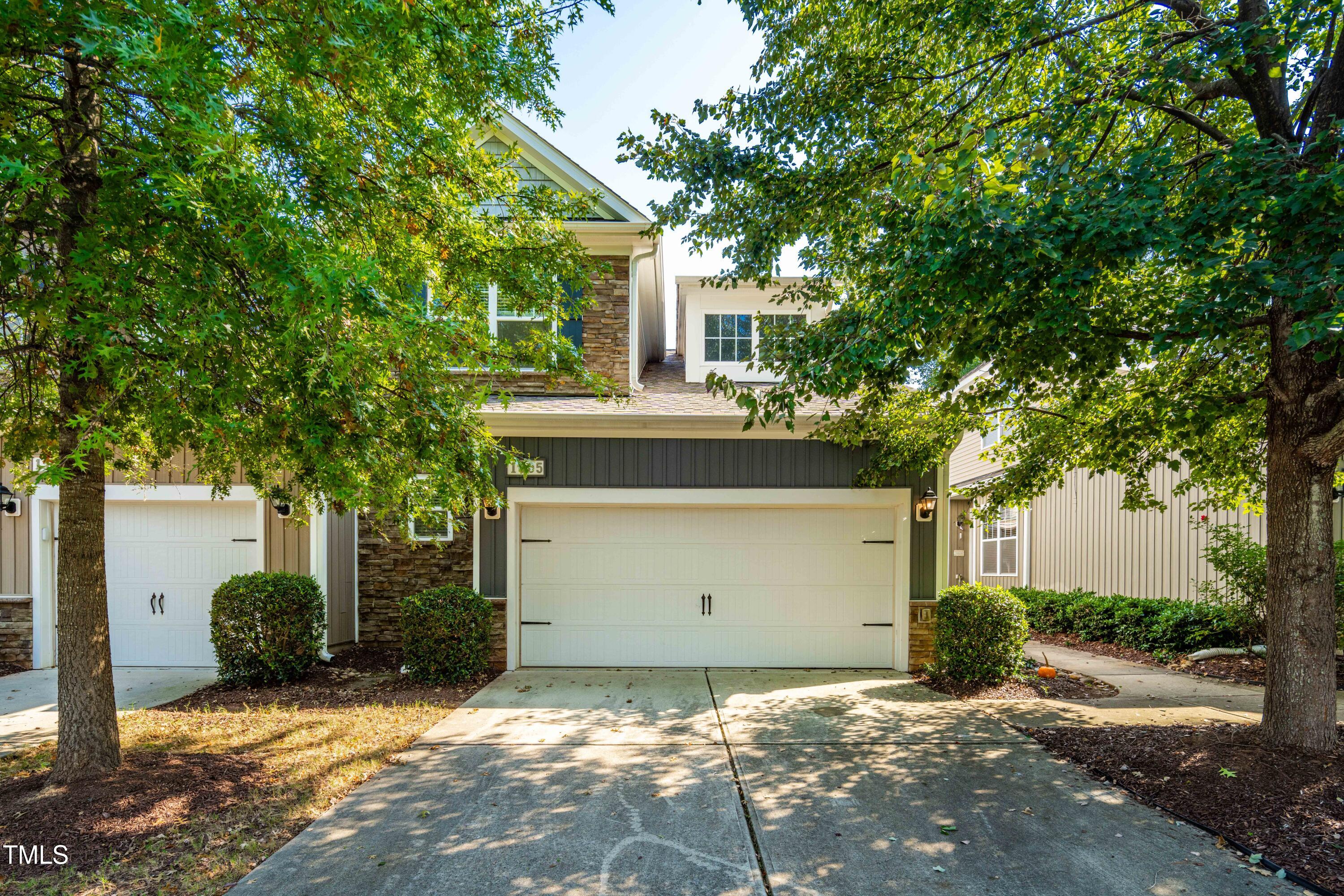 1305 Silver Beach Way Raleigh, NC 27606 - Photo 2 of 47 a house with trees in front of it