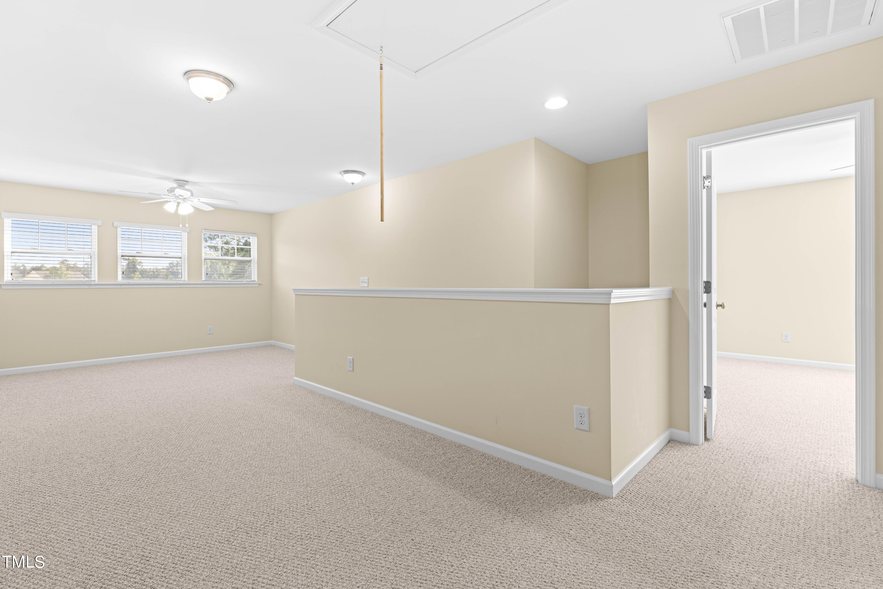 1305 Silver Beach Way Raleigh, NC 27606 - Photo 21 of 47 a view of an empty room with a window