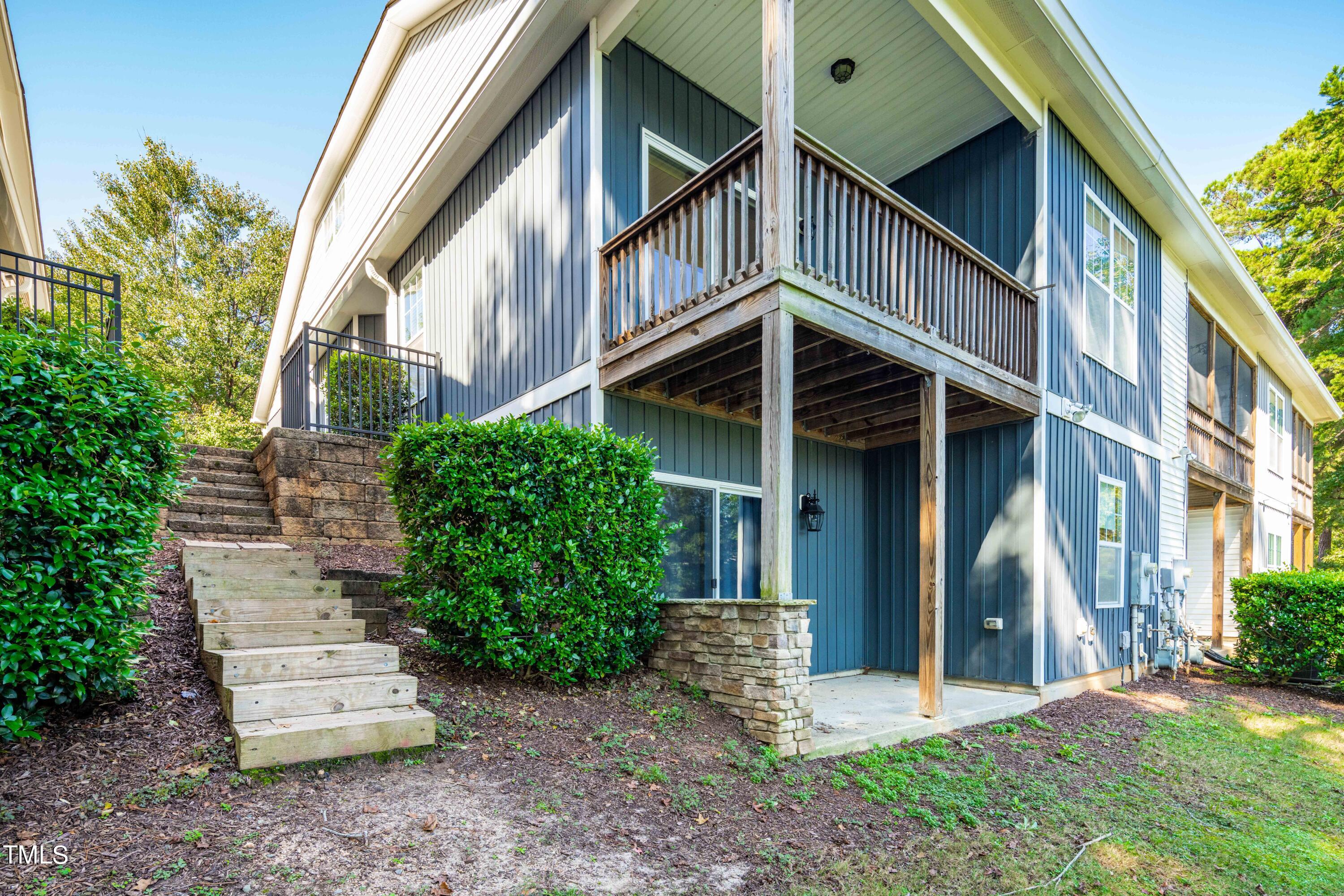 1305 Silver Beach Way Raleigh, NC 27606 - Photo 37 of 47 a front view of a house with a garden