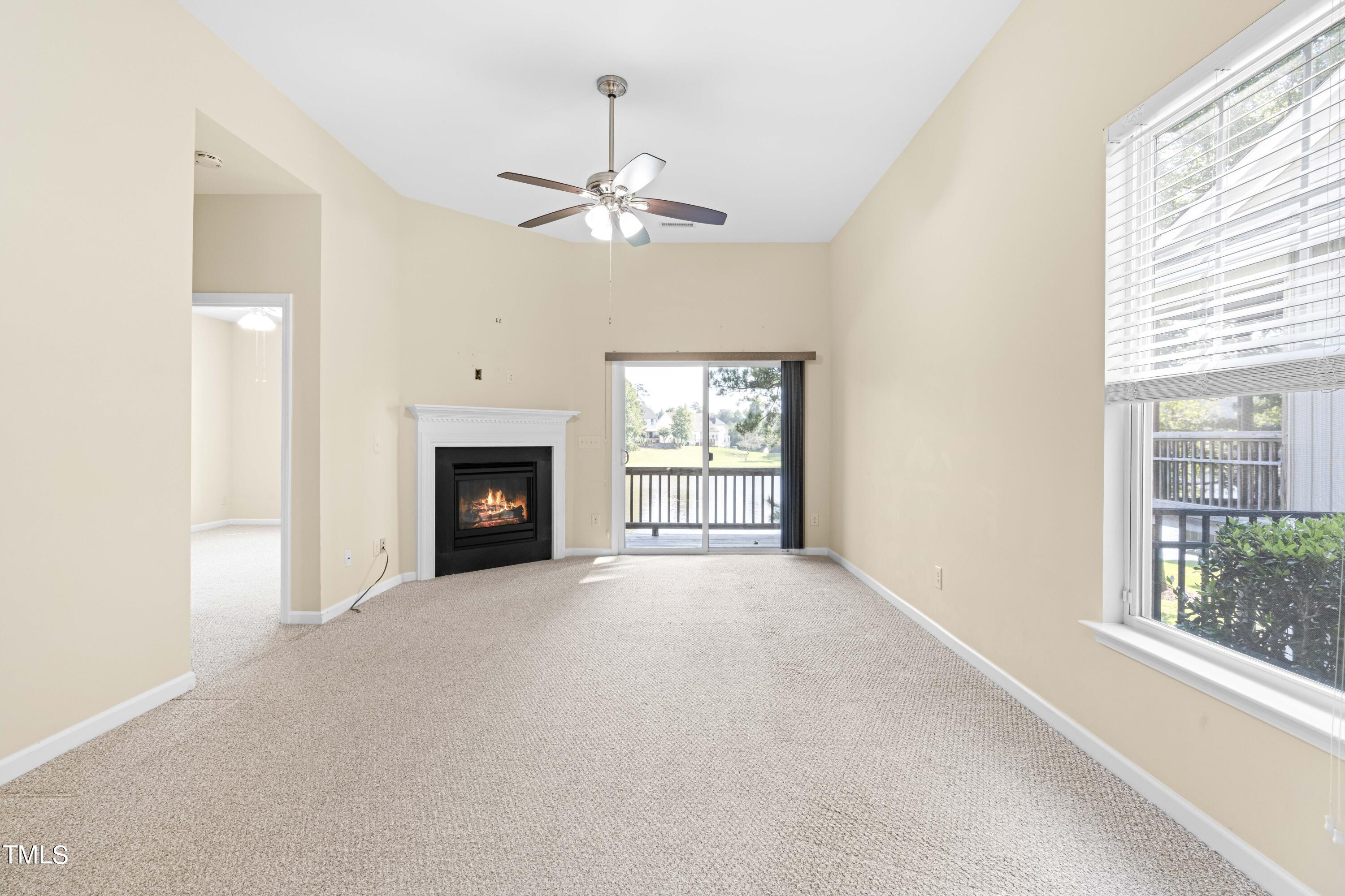 1305 Silver Beach Way Raleigh, NC 27606 - Photo 5 of 47 a view of an empty room with a window