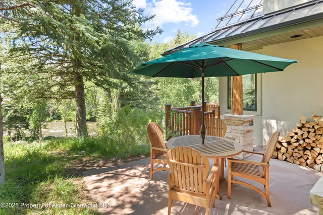a view of balcony with furniture