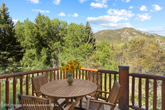 a view of a chair in a balcony