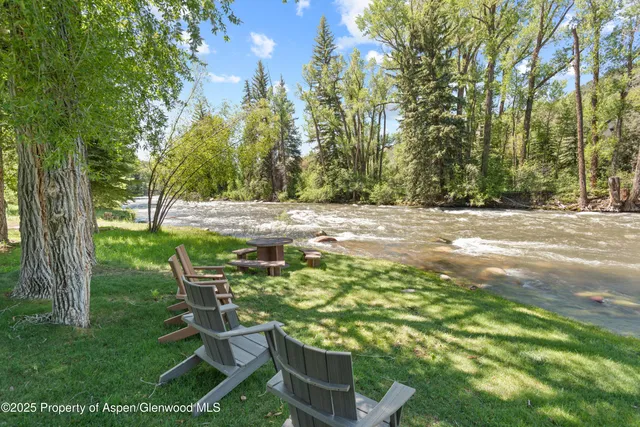 a view of backyard with green space