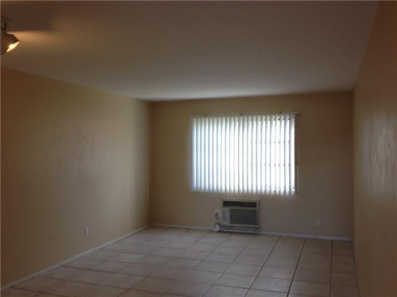 1050 East Sample Road, Unit 108B Pompano Beach, FL 33064 - Photo 4 of 9 Exterior Front.