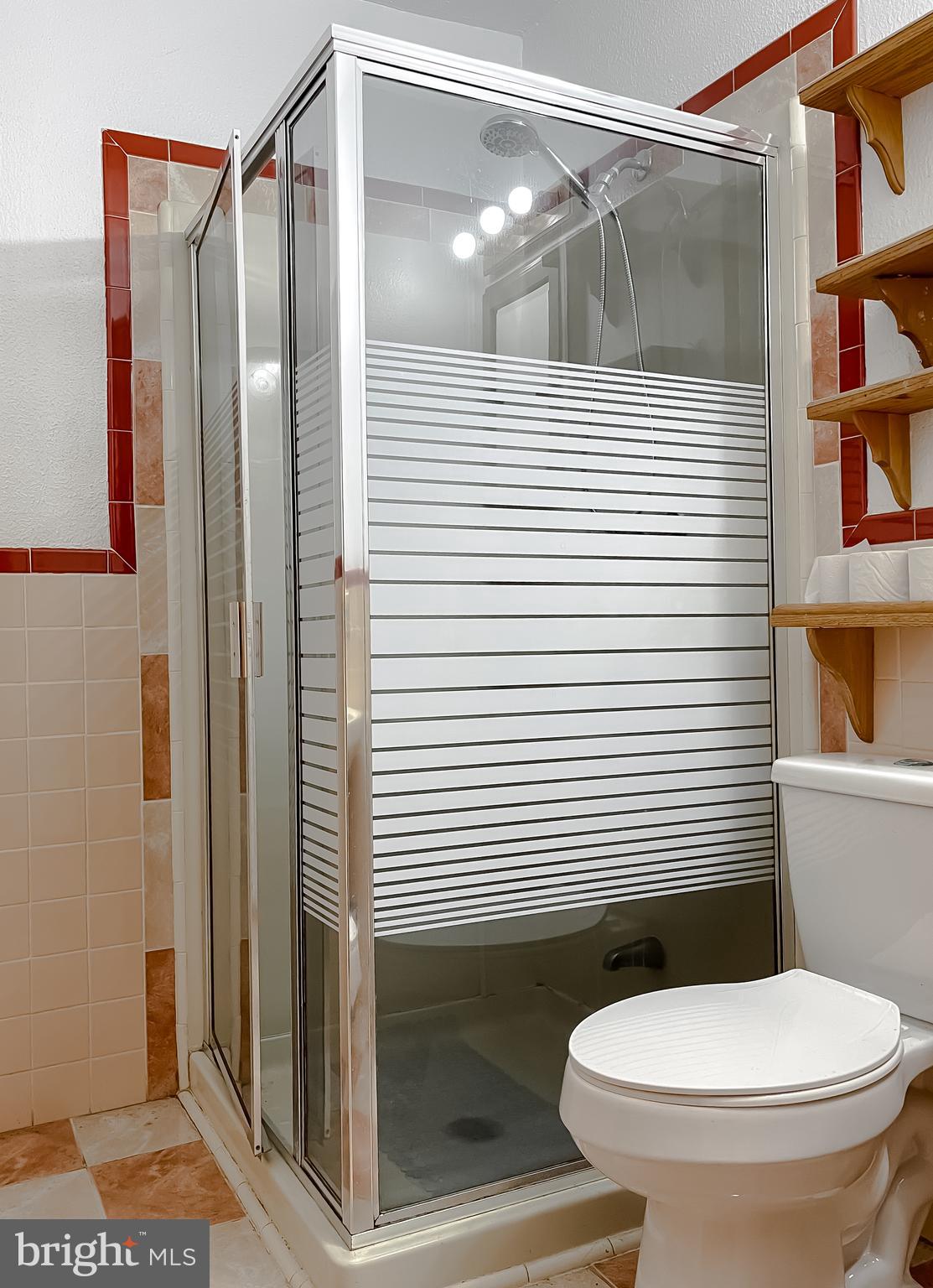 11525 Palo Alto Road Lusby, MD 20657 - Photo 62 of 74 a bathroom with a toilet and a shower