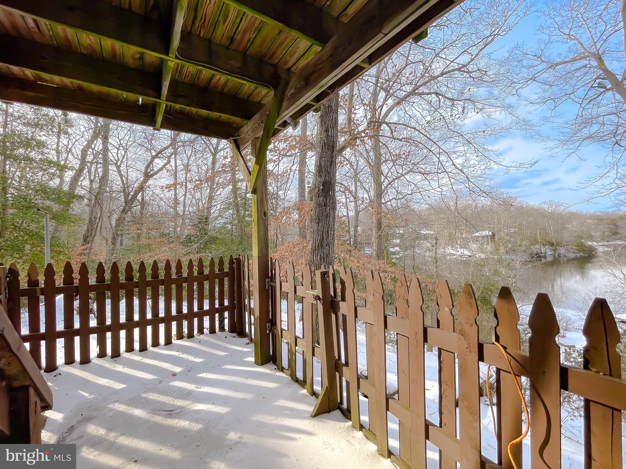 11525 Palo Alto Road Lusby, MD 20657 - Photo 64 of 74 a view of a backyard with wooden fence
