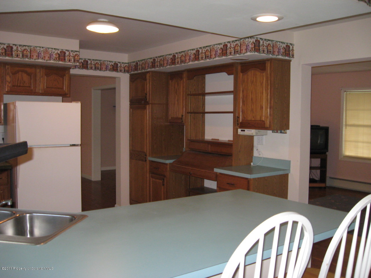 112 Ridgeview Drive Scranton, PA 18504 - Photo 4 of 15 a kitchen with stainless steel appliances granite countertop a refrigerator and a sink