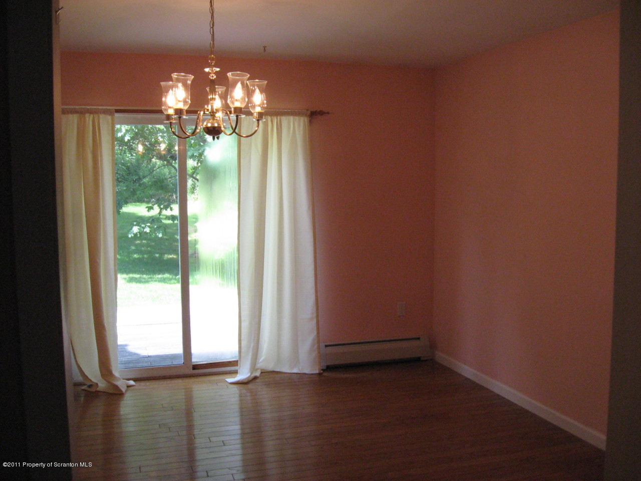 112 Ridgeview Drive Scranton, PA 18504 - Photo 7 of 15 a view of a room with window and chandelier