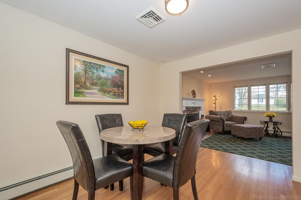 18 Harding Street Milford, MA 01757 - Photo 6 of 28 a view of a dining room with furniture window and wooden floor