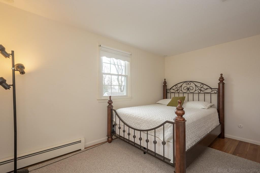18 Harding Street Milford, MA 01757 - Photo 10 of 28 a bedroom with a bed and a window