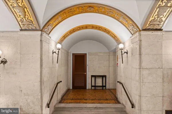 a view of entryway with a front door