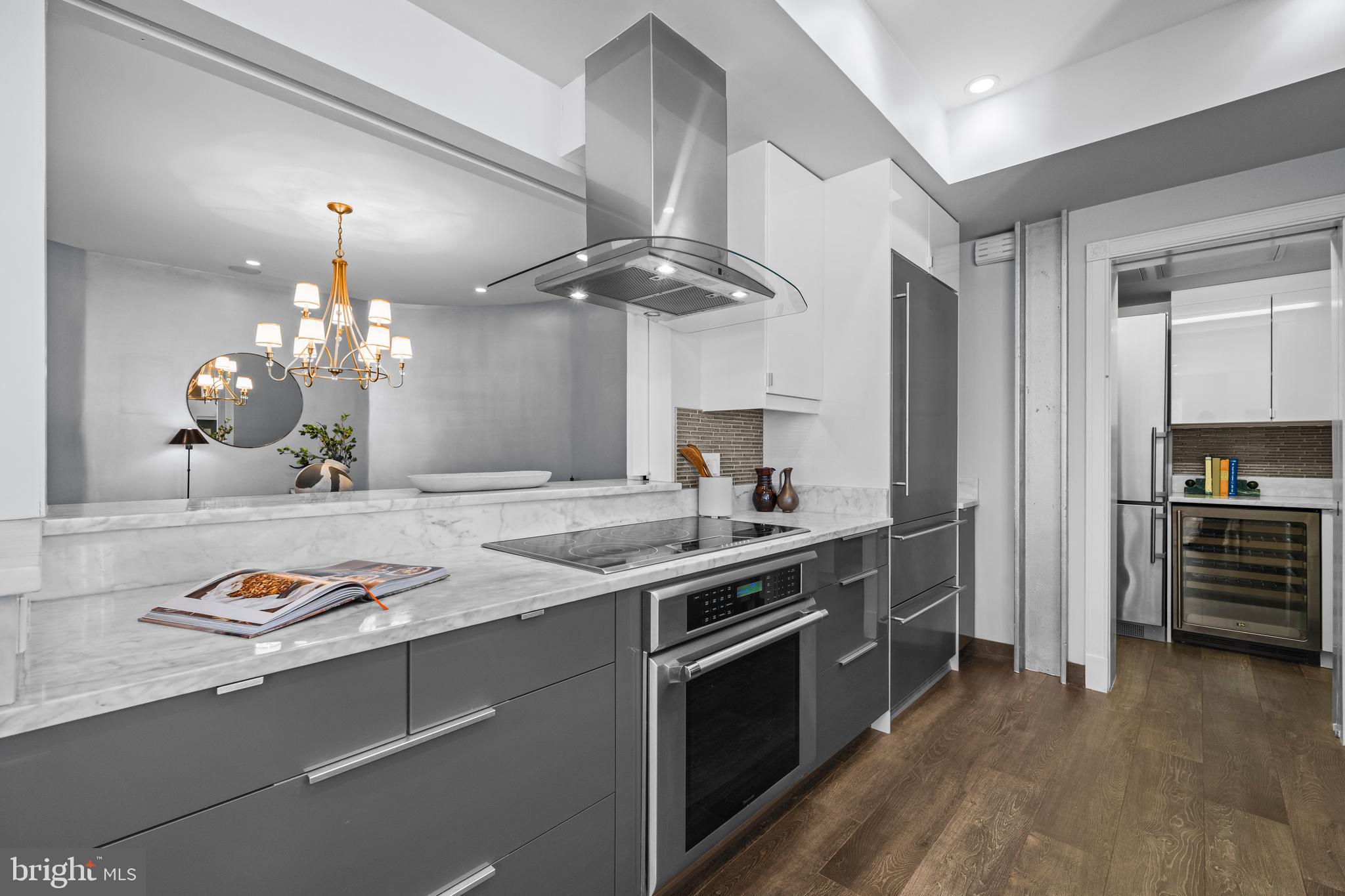 1901 Wyoming Avenue Northwest, Unit 11 Washington, DC 20009 - Photo 9 of 36 a kitchen with a stove and a refrigerator