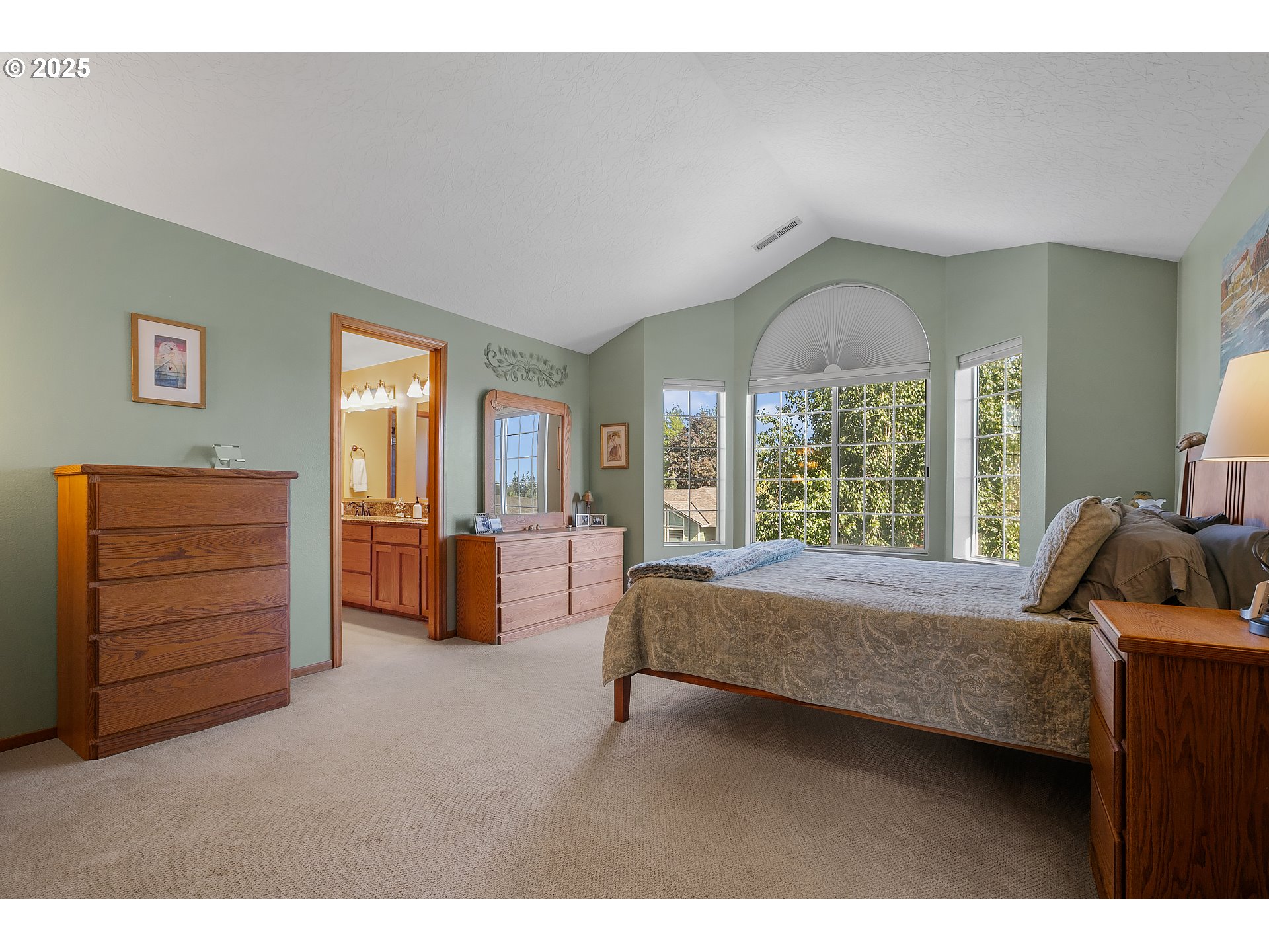 3003 Northeast 164th Street Ridgefield, WA 98642 - Photo 23 of 38 a bedroom with a bed and a dresser