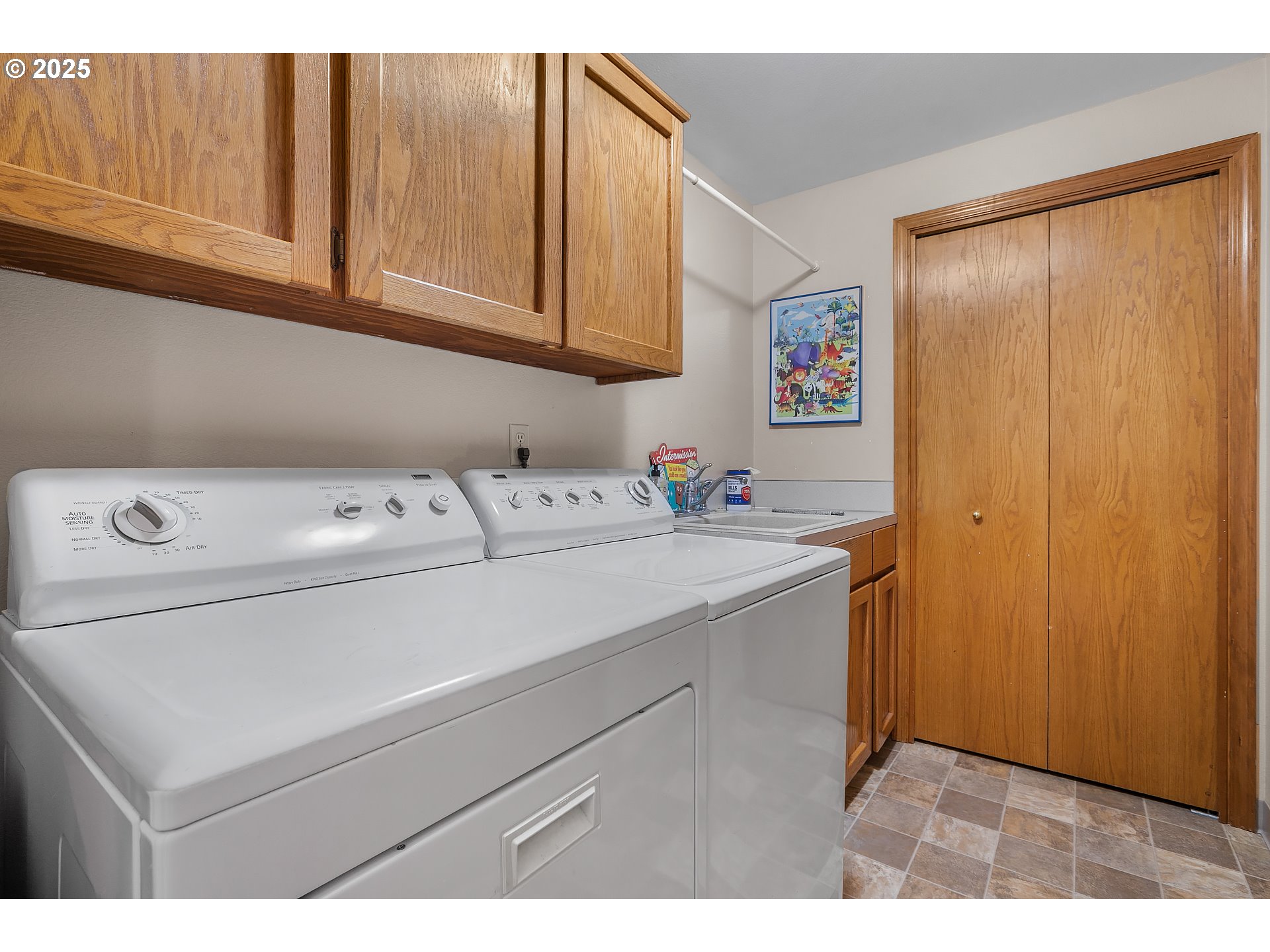 3003 Northeast 164th Street Ridgefield, WA 98642 - Photo 37 of 38 a utility room with dryer and washer