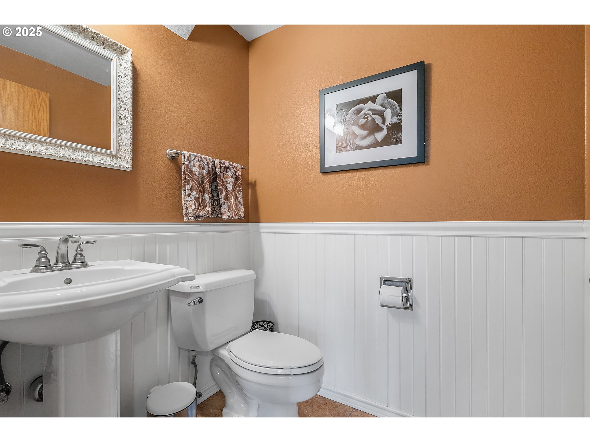 3003 Northeast 164th Street Ridgefield, WA 98642 - Photo 38 of 38 a bathroom with a toilet a sink and mirror