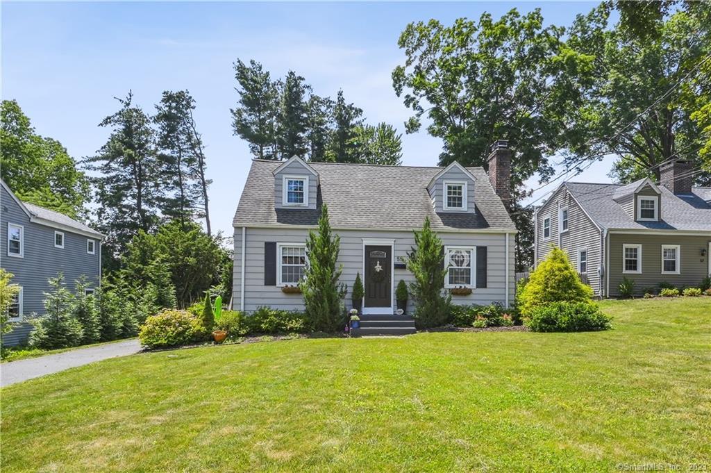 front view of a house with a yard