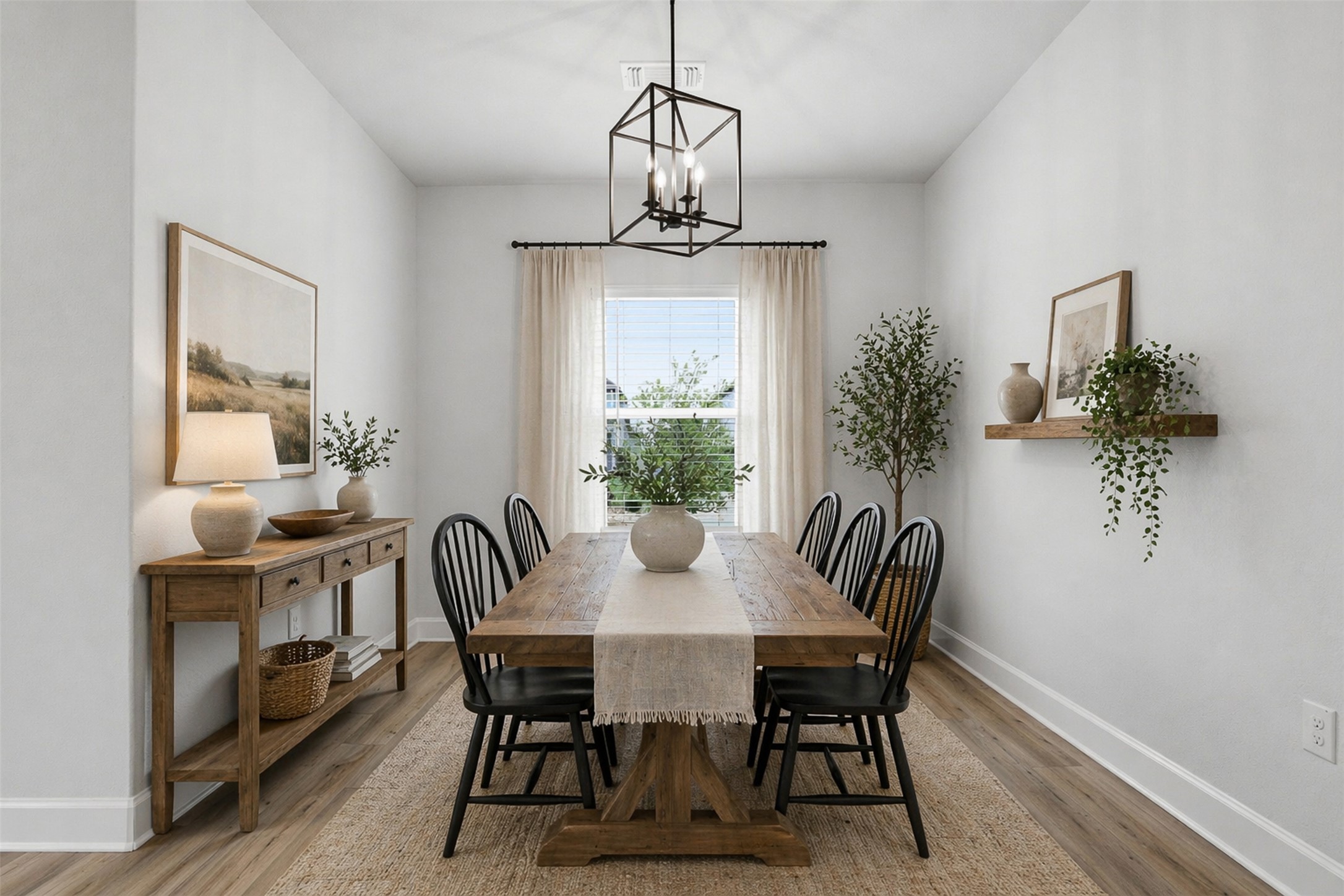9320 Gladsome Path Manor, TX 78653 - Photo 5 of 34 a view of a dining room with furniture window and wooden floor
