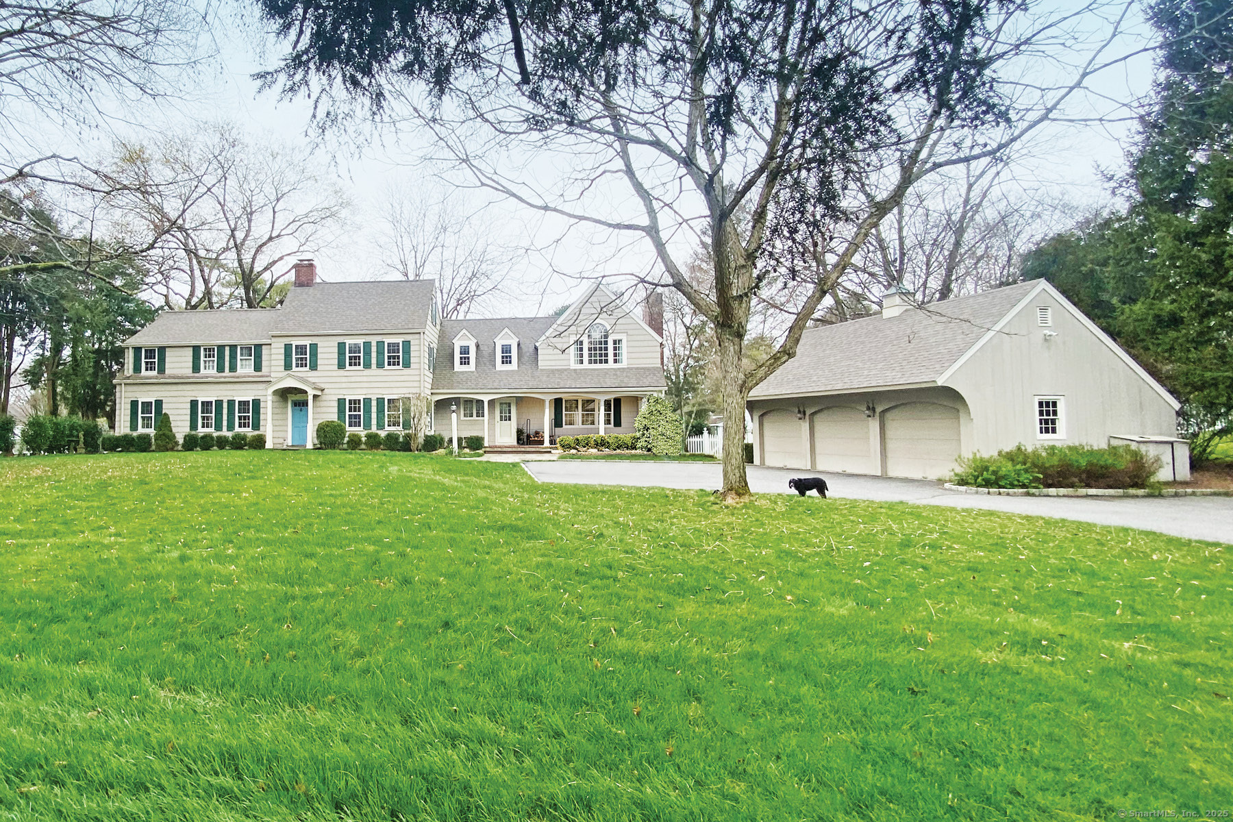 95 Compo Road North Westport, CT 06880 - Photo 1 of 28 a front view of a house with a yard