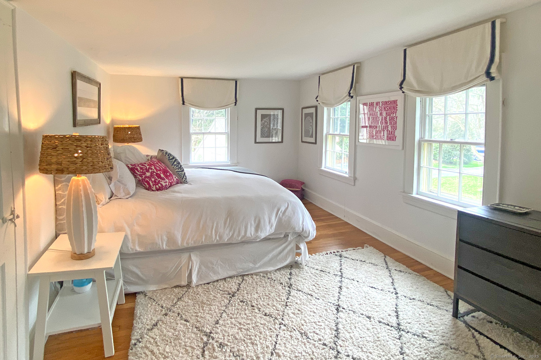 95 Compo Road North Westport, CT 06880 - Photo 15 of 28 a bedroom with a bed a closet and large mirror