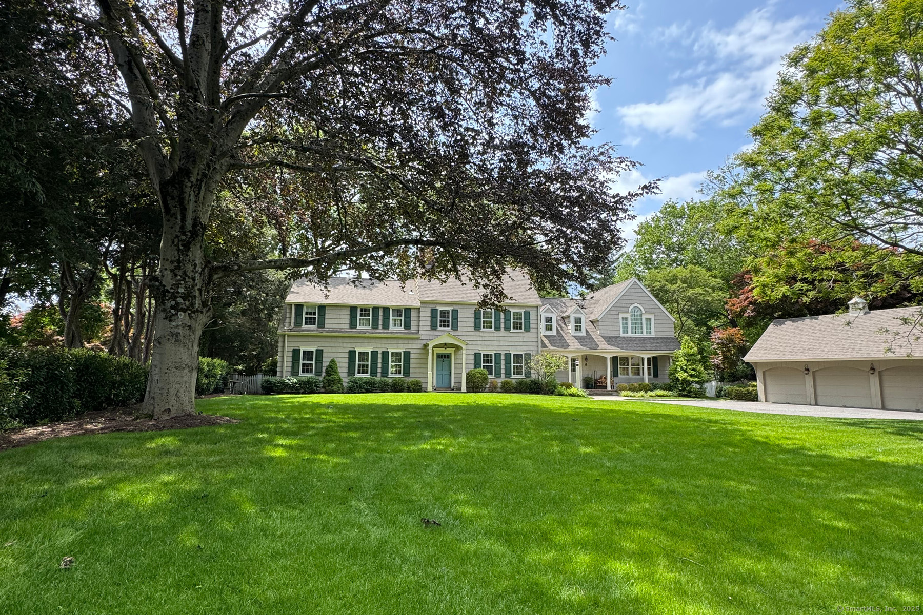 95 Compo Road North Westport, CT 06880 - Photo 16 of 28 a view of a house with a big yard and potted plants and large trees