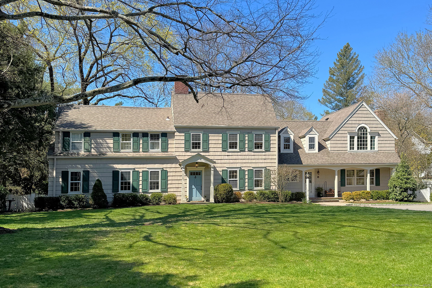95 Compo Road North Westport, CT 06880 - Photo 2 of 28 a front view of a residential apartment building with a yard