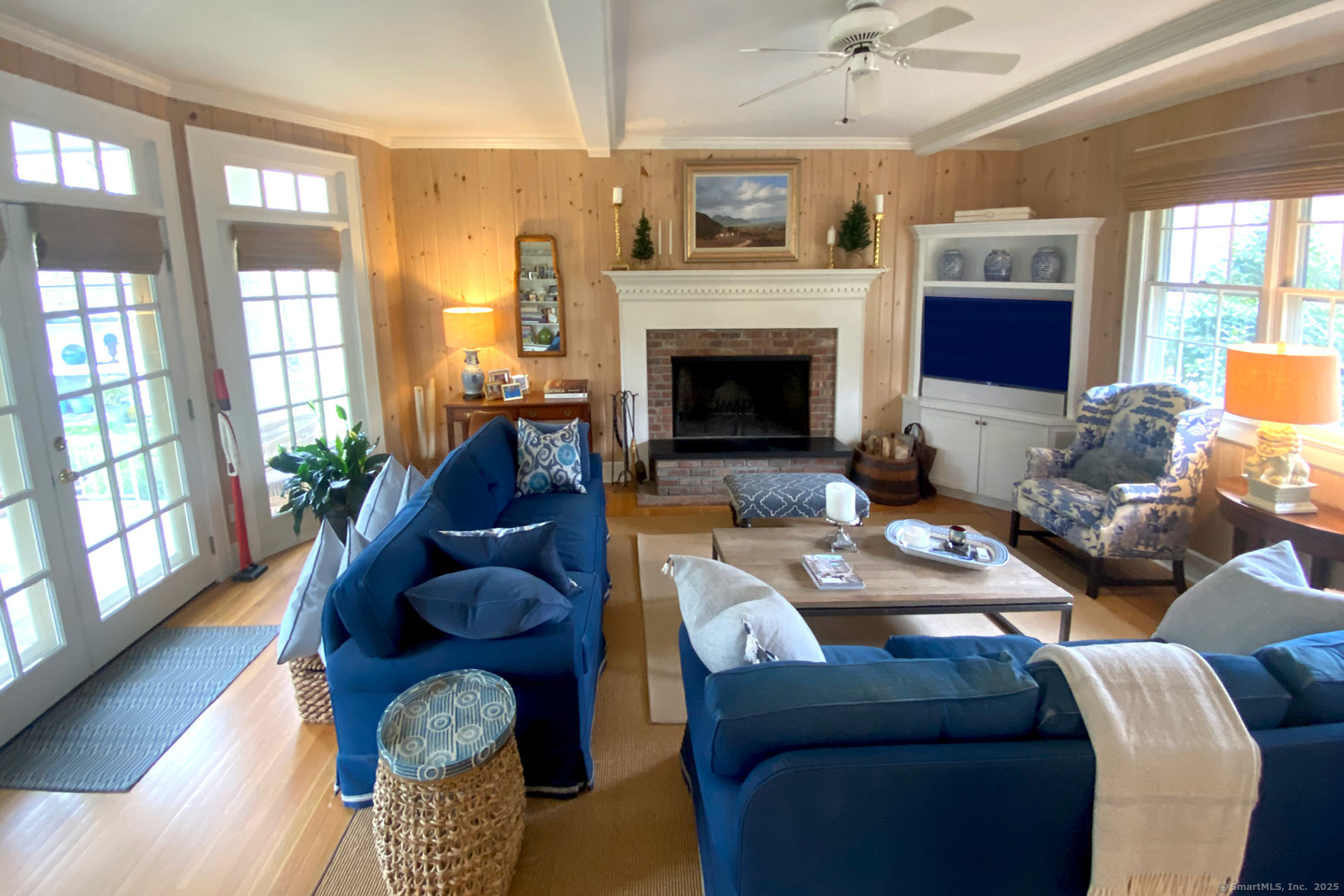 95 Compo Road North Westport, CT 06880 - Photo 3 of 28 a living room with furniture fireplace and a large window