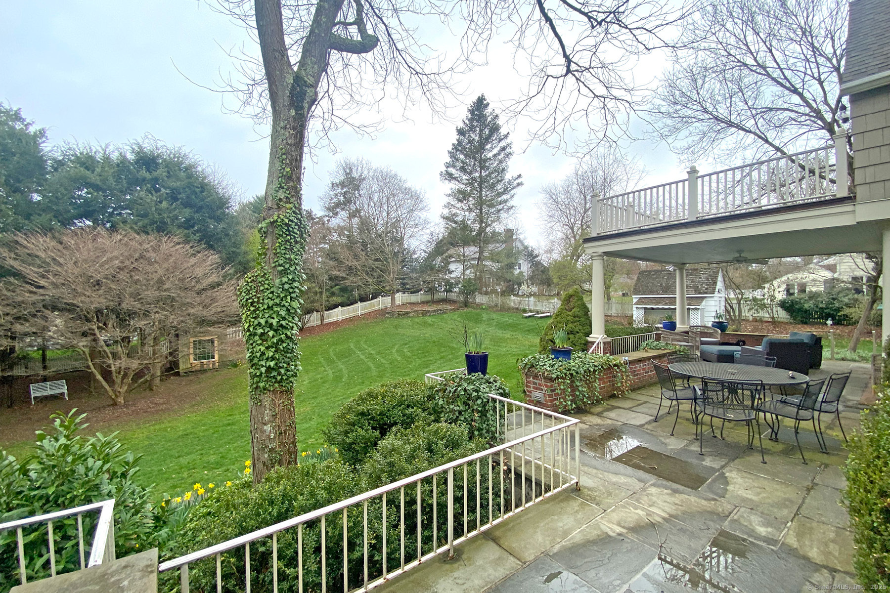 95 Compo Road North Westport, CT 06880 - Photo 6 of 28 a view of a house with backyard sitting area and garden