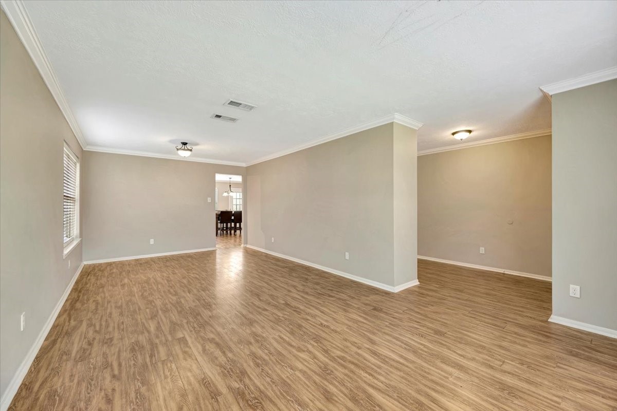 4235 Park Ridge Drive Pasadena, TX 77504 - Photo 10 of 41 a view of empty room with wooden floor