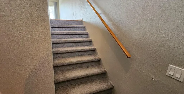 a view of a hallway with front door