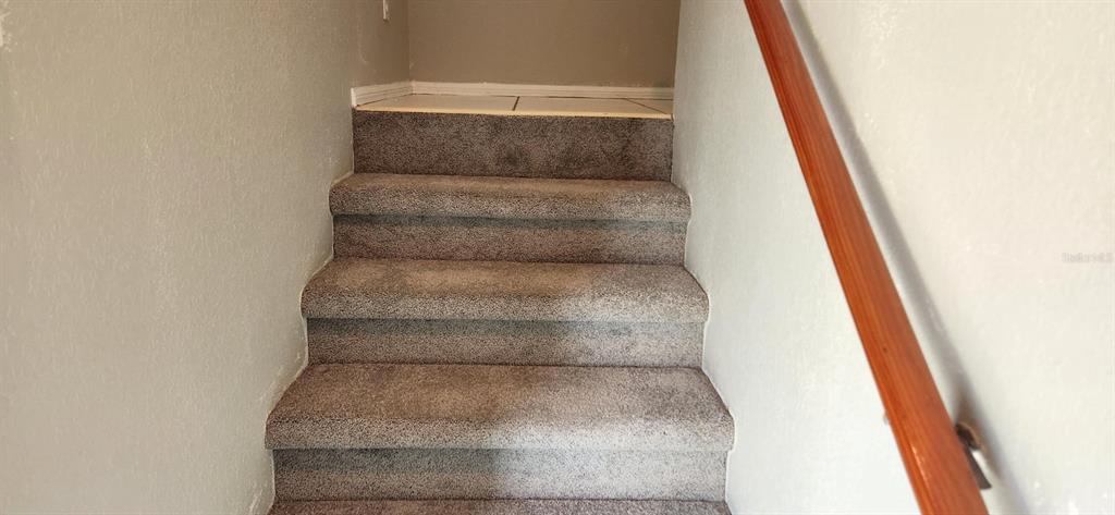 6554 Fairway Gardens Drive, Unit 6554 Bradenton, FL 34203 - Photo 22 of 25 a view of staircase