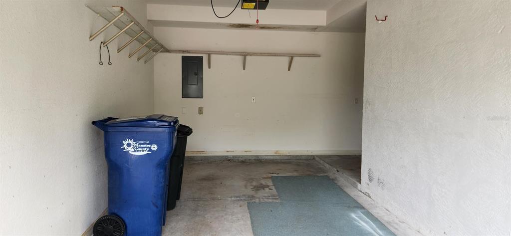 6554 Fairway Gardens Drive, Unit 6554 Bradenton, FL 34203 - Photo 23 of 25 a view of a hallway with front door