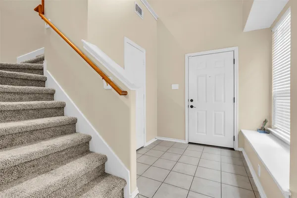 a view of an entryway with staircase