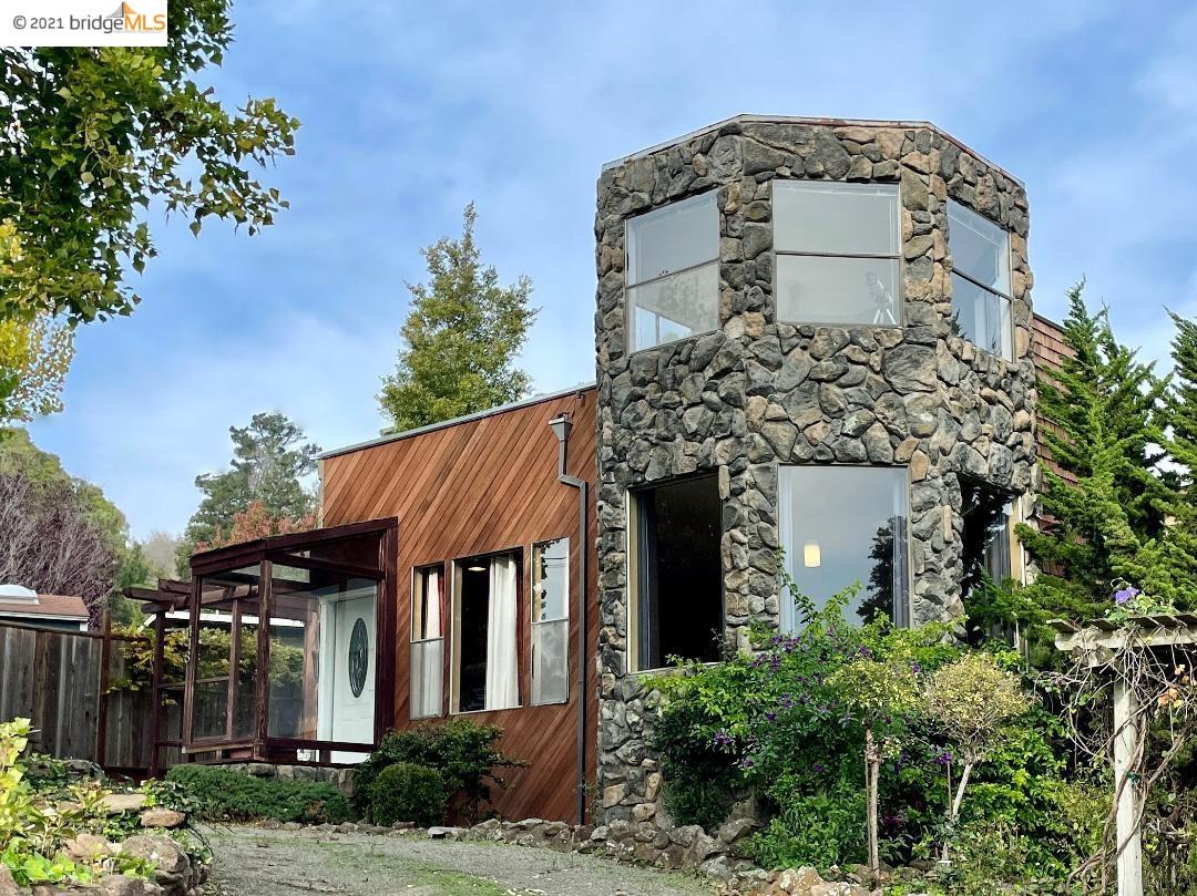 front view of a house with a small yard