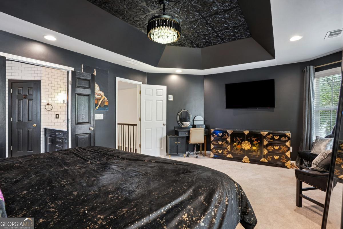 1229 Crescentwood Lane Decatur, GA 30032 - Photo 14 of 25 a bed room with a bed mirror and a window