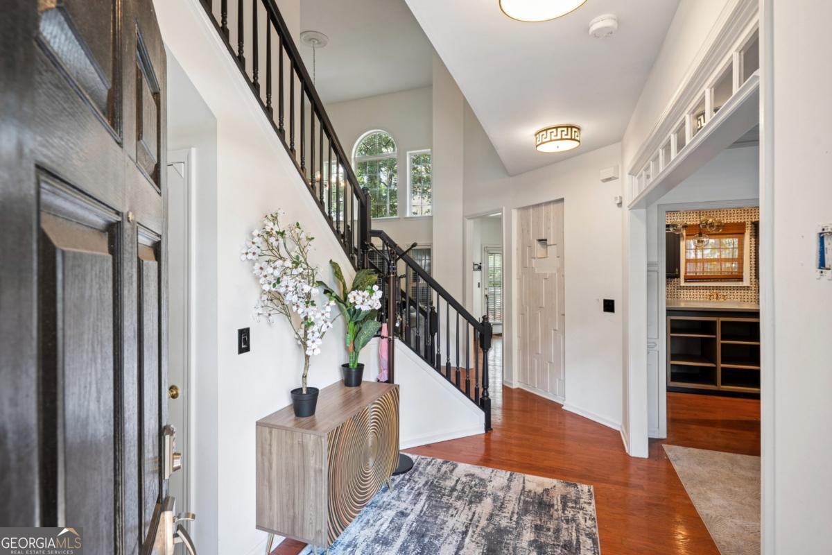 1229 Crescentwood Lane Decatur, GA 30032 - Photo 2 of 25 a view of entryway with wooden floor and stairs