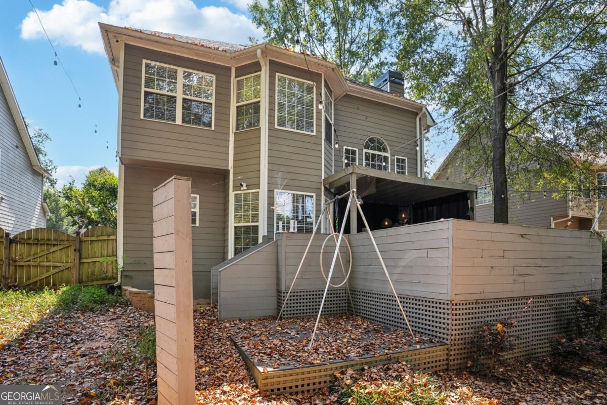 1229 Crescentwood Lane Decatur, GA 30032 - Photo 25 of 25 a front view of a house with garden