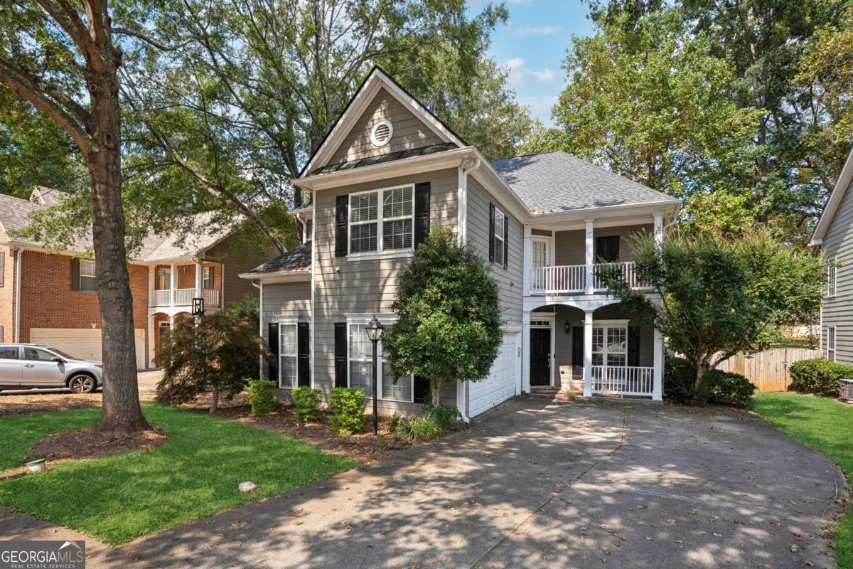 1229 Crescentwood Lane Decatur, GA 30032 - Photo 3 of 25 a front view of a house with a yard