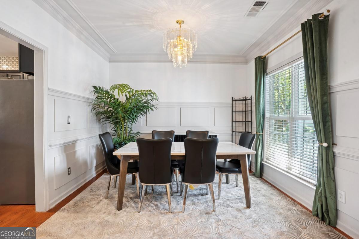 1229 Crescentwood Lane Decatur, GA 30032 - Photo 4 of 25 a view of a dining room with furniture window and outside view