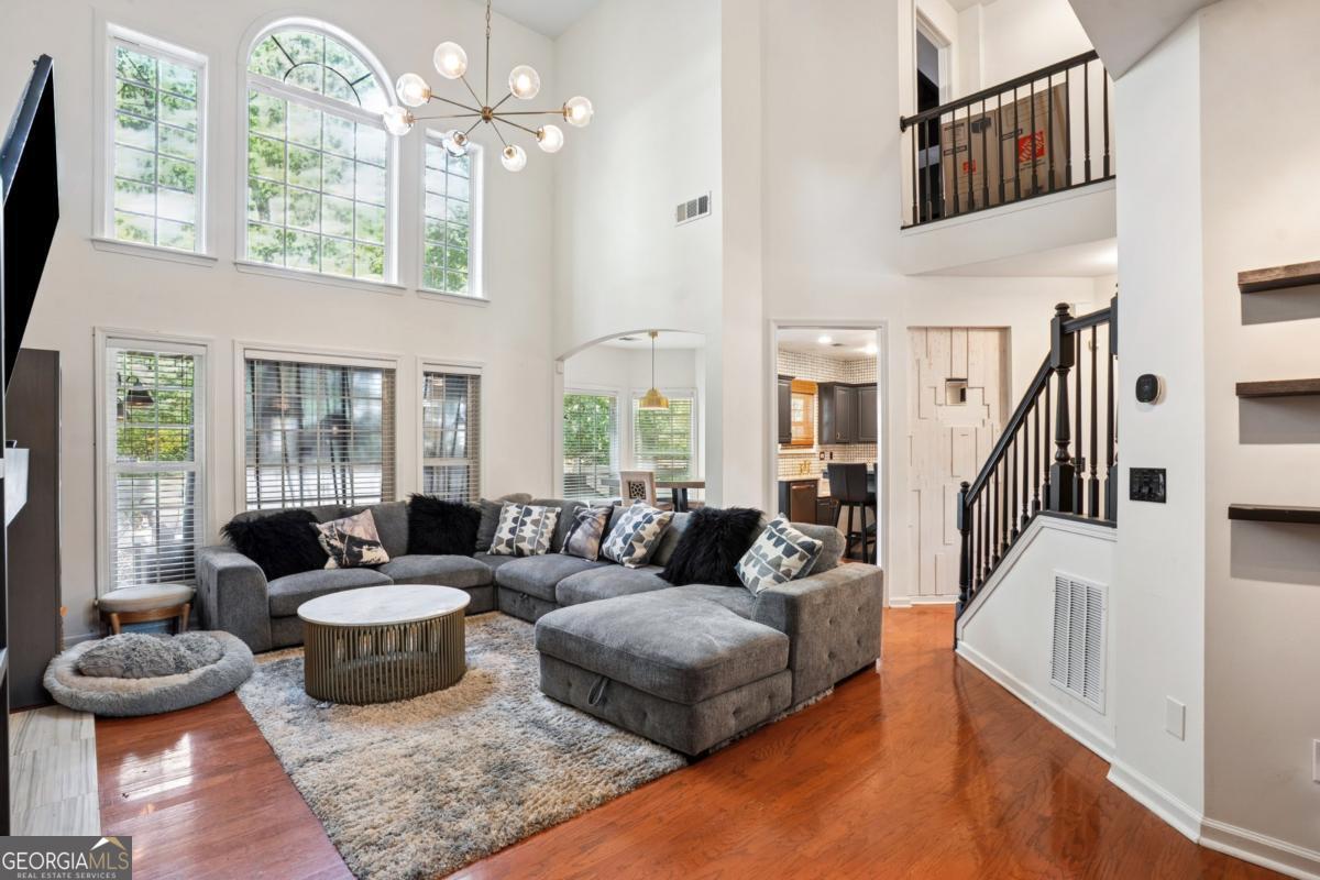 1229 Crescentwood Lane Decatur, GA 30032 - Photo 9 of 25 a living room with furniture and a large window