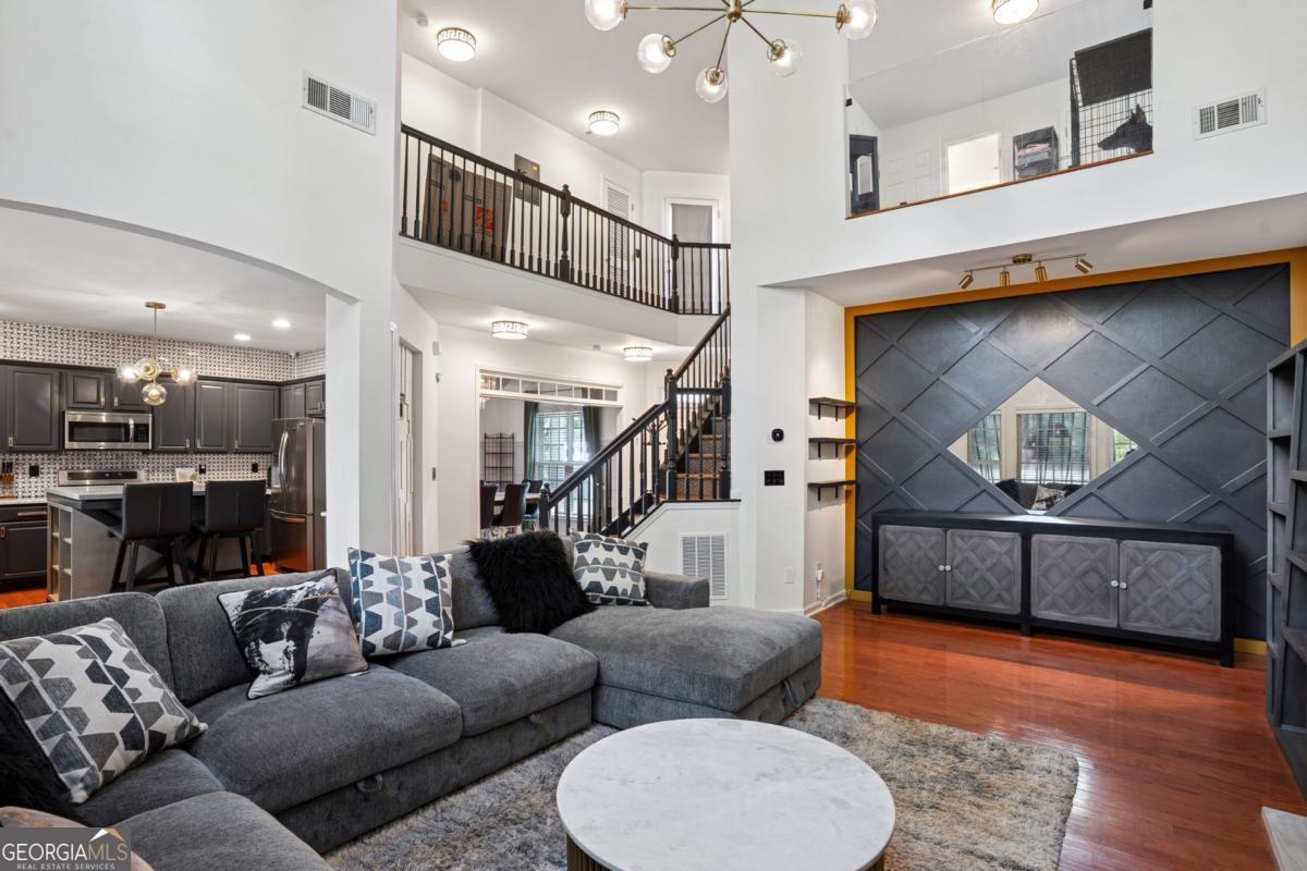 1229 Crescentwood Lane Decatur, GA 30032 - Photo 10 of 25 a living room with furniture and a fireplace