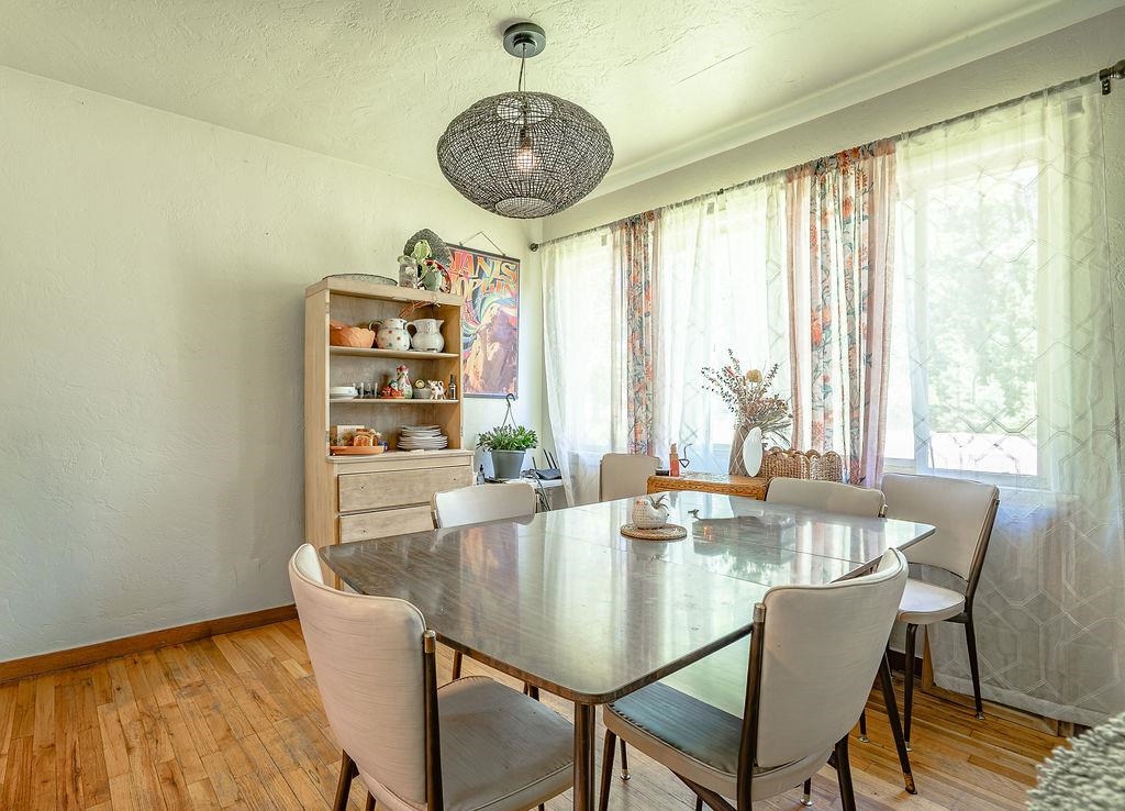 470 Riverside Avenue Chester, CA 96020 - Photo 6 of 25 a view of a dining room with furniture window and outside view