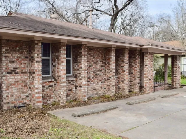 a couple of table and chair in front of door